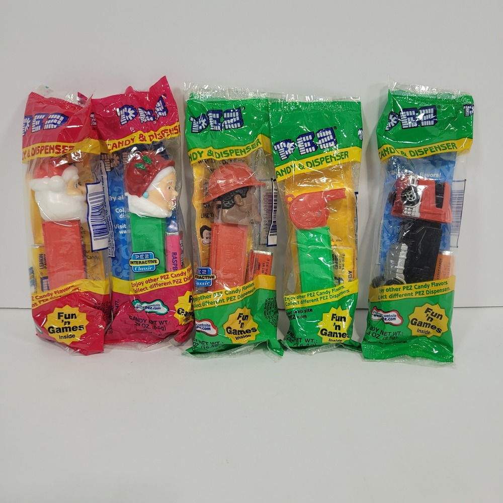 Lot of 5 Vintage PEZ Dispensers Factory Sealed Santa Mrs Claus Firefighter Truck